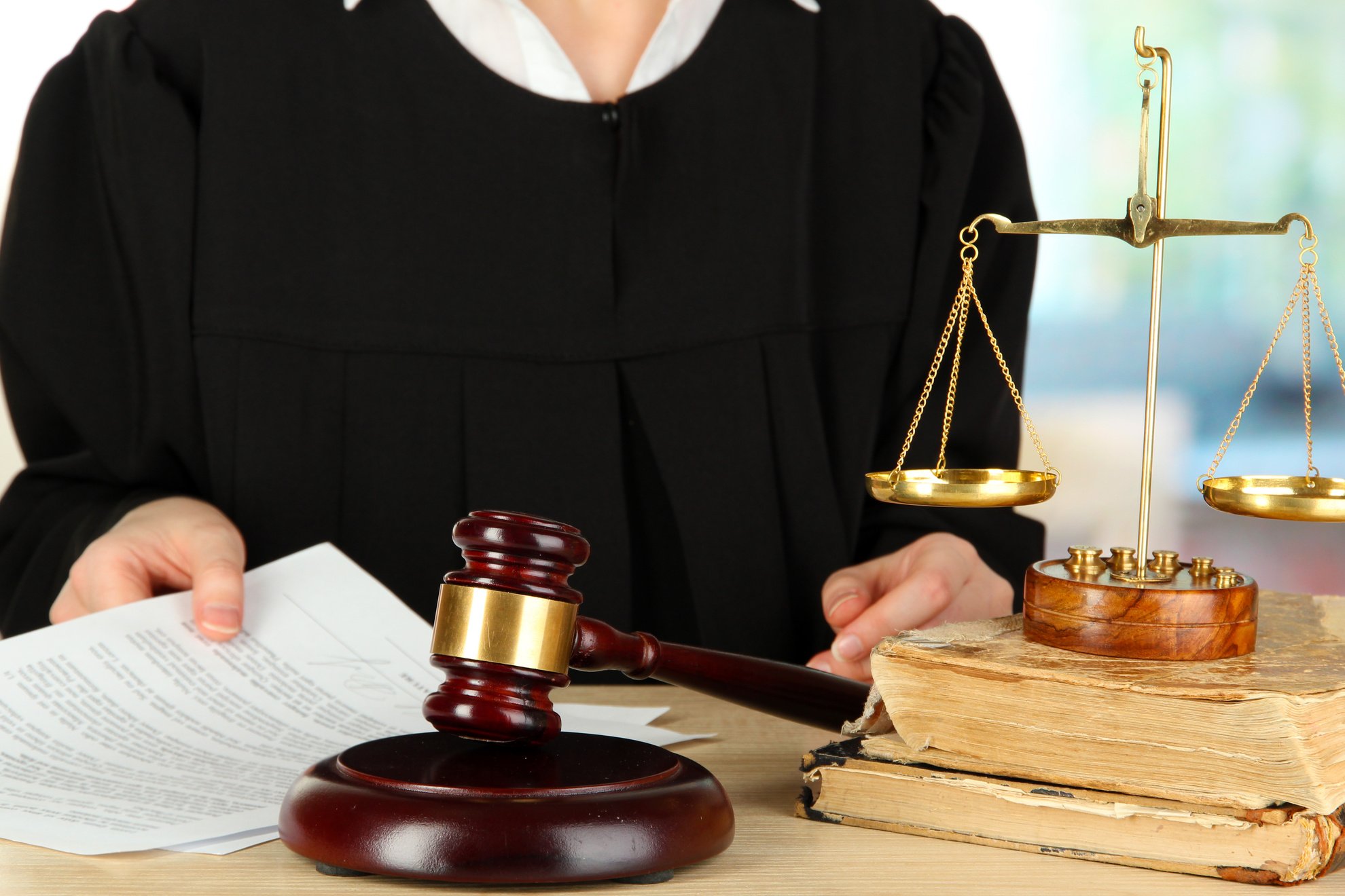 Judge Sitting at Table during Court Hearings